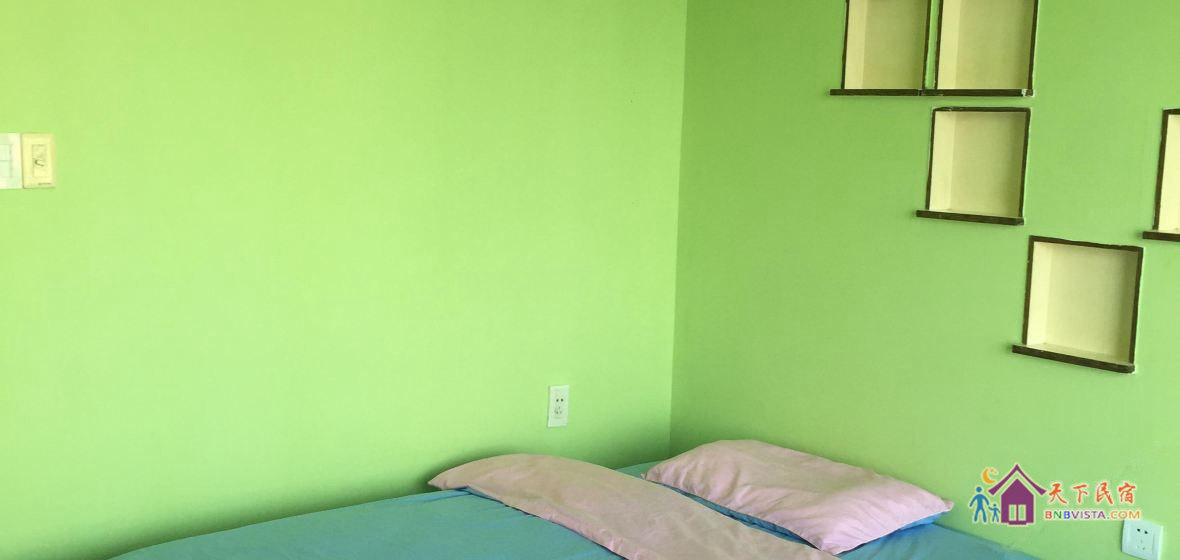 绿色情调浪漫双人阳光榻榻米房