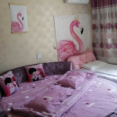 温馨圆床家庭房