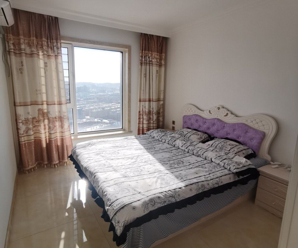  天下民宿 之 普兰店温馨民宿(沿河路分店) 